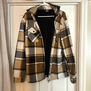 Men’s button up jacket. Size S. Fits like a M. Never worn, like brand new.